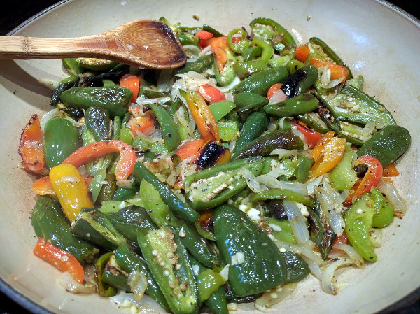 Broil peppers and onions, then transfer into a skillet
