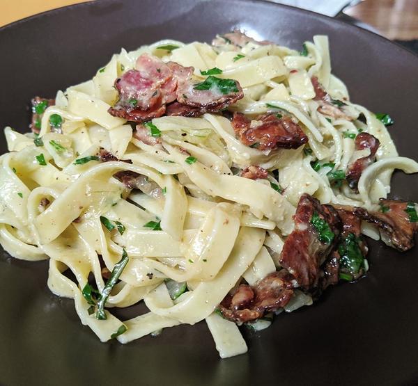 A serving of pasta carbonara